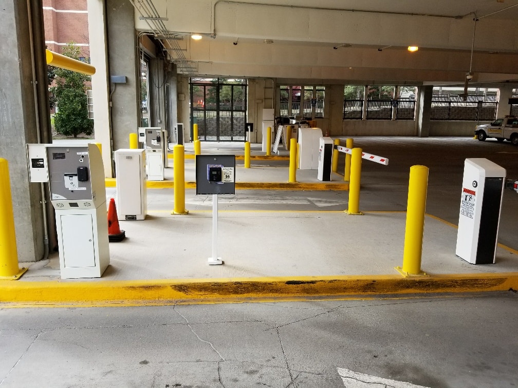 Employee secure parking with keycard scanner.