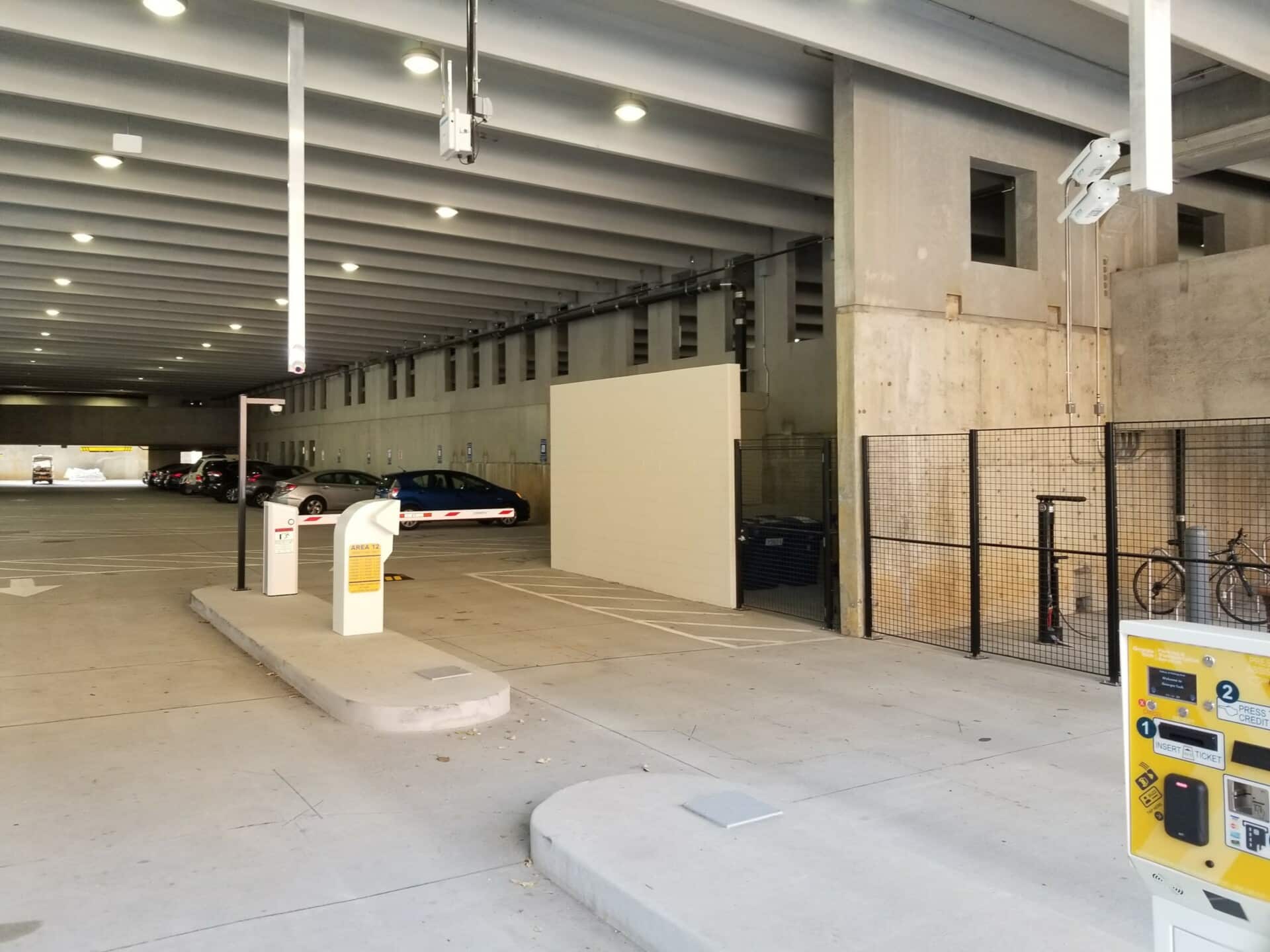 Security cameras monitor entrance and exit of secure parking area.