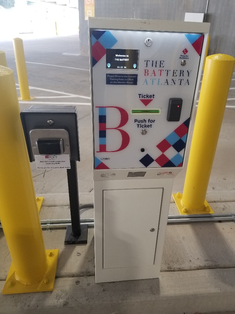 Digital display shares cost of secure parking with button to push and receive parking ticket.