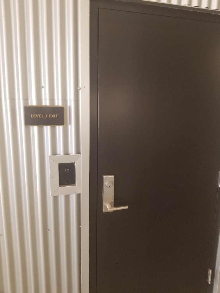Scanner access for locked metal security door.