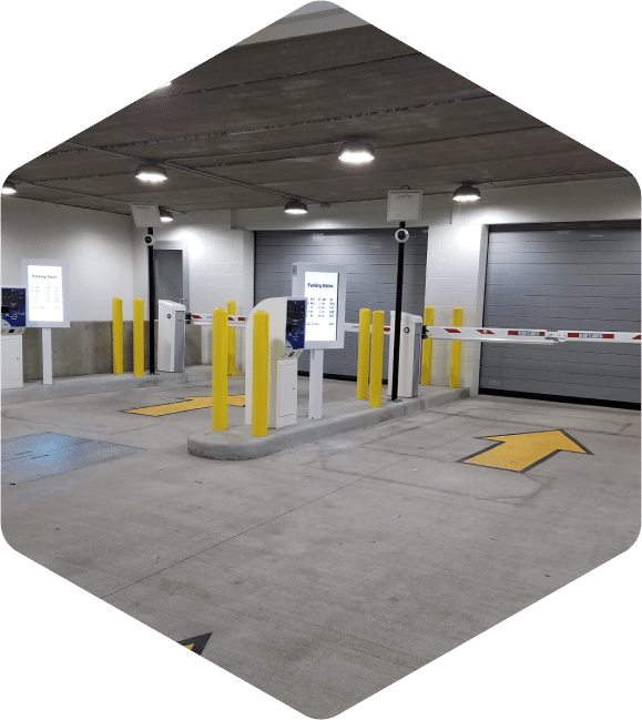 Improved parking security with entry and exit terminals and overhead doors installed.