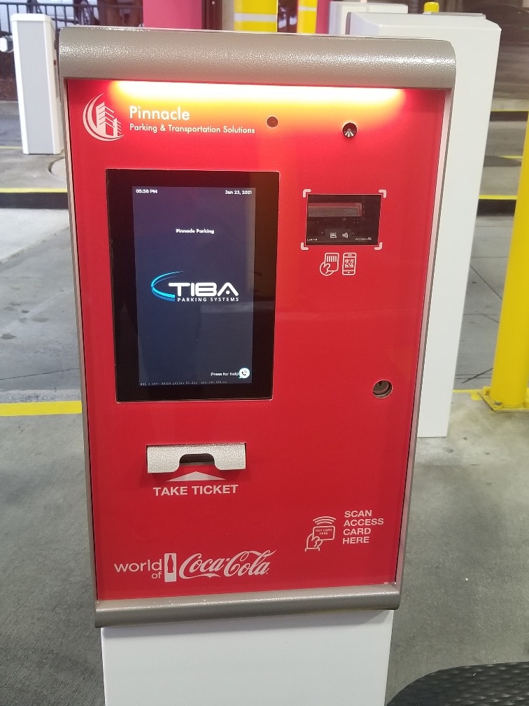 Secure parking system allowing scanned access card entry.