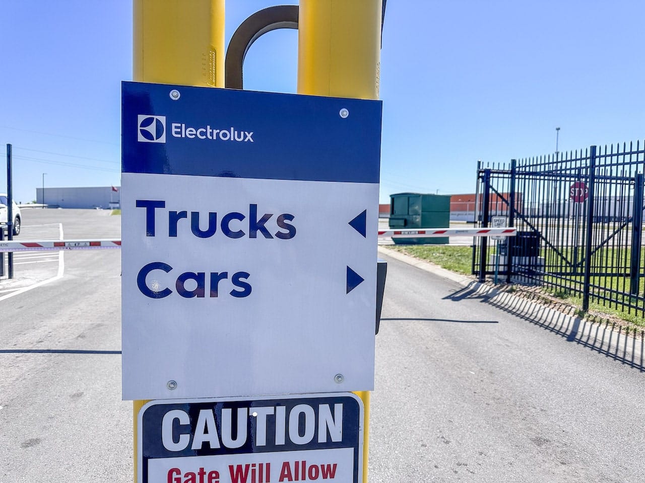 Electrolux banner for guiding separation of trucks and cars at parking.