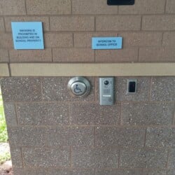 Access control entry with accessibility push button for entry.