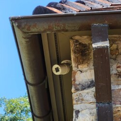 CCTV / CCVE installed under the awning of an apartment building.